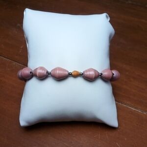 Bracelet, stretchy, peach colored beads